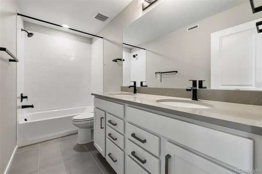 Furnished interior view inside a new home in Harvest Crossing, Aurora (Image 6).