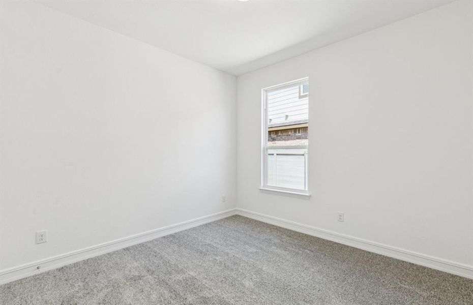 Secondary bedroom designed for comfort and convenience Secondary bedroom designed for comfort and convenience