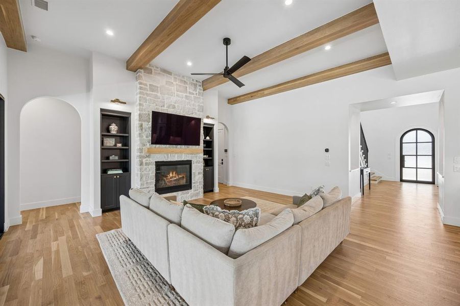 Showcasing the beauty of exquisite hardwood flooring, this image captures a welcoming entry point with a delightful view, highlighting the charm and character of the space.