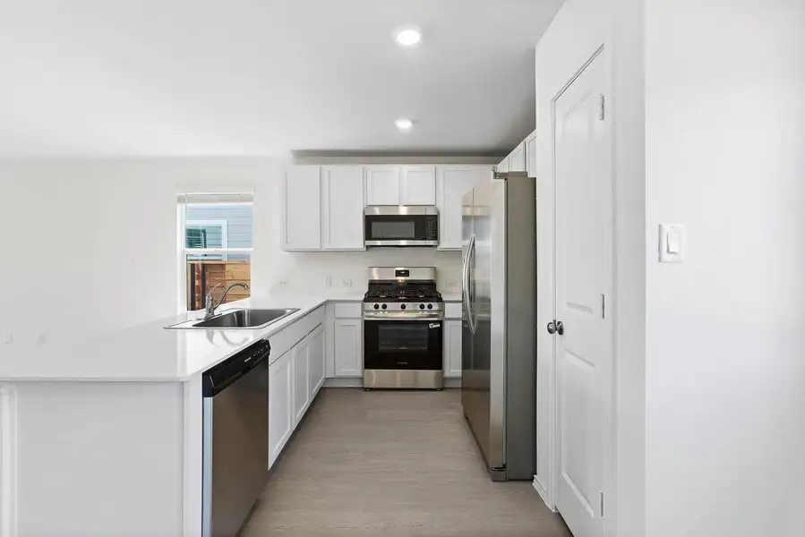Furnished interior view inside a new home in Plum Creek North: Stonehill Collection, Kyle (Image 3).