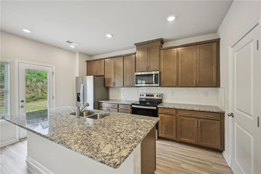 Furnished interior view inside a new home in Hawthorne Station, College Park (Image 16).