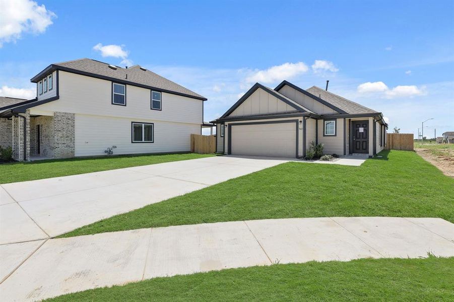 Front exterior of a new home in Rocky Creek Crossing, Fort Worth, TX, highlighting curb appeal (Image 1).