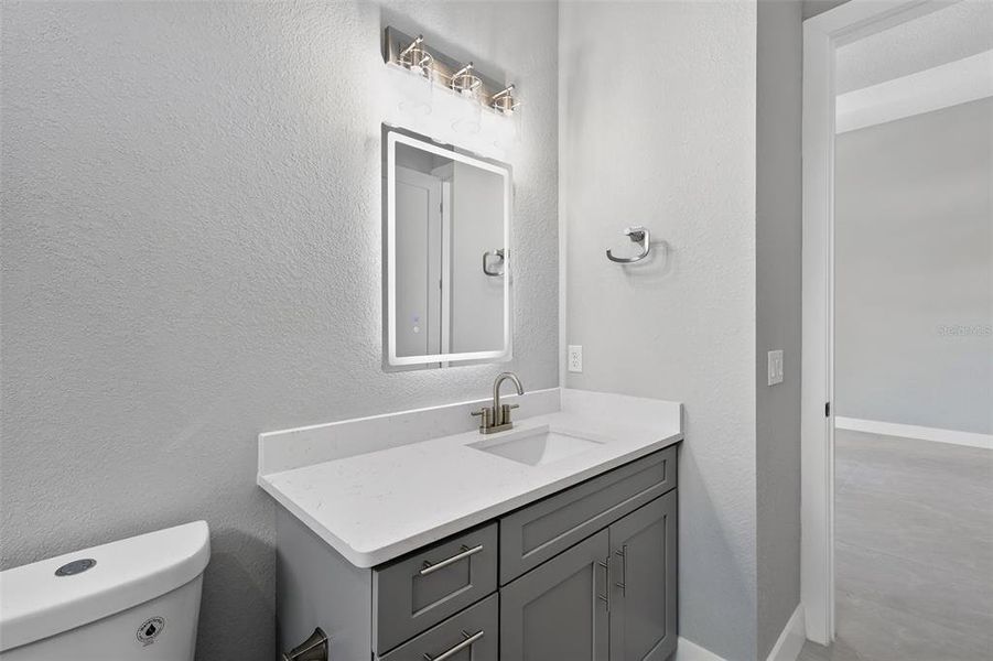 Furnished interior view inside a new home in , Port Charlotte (Image 43).