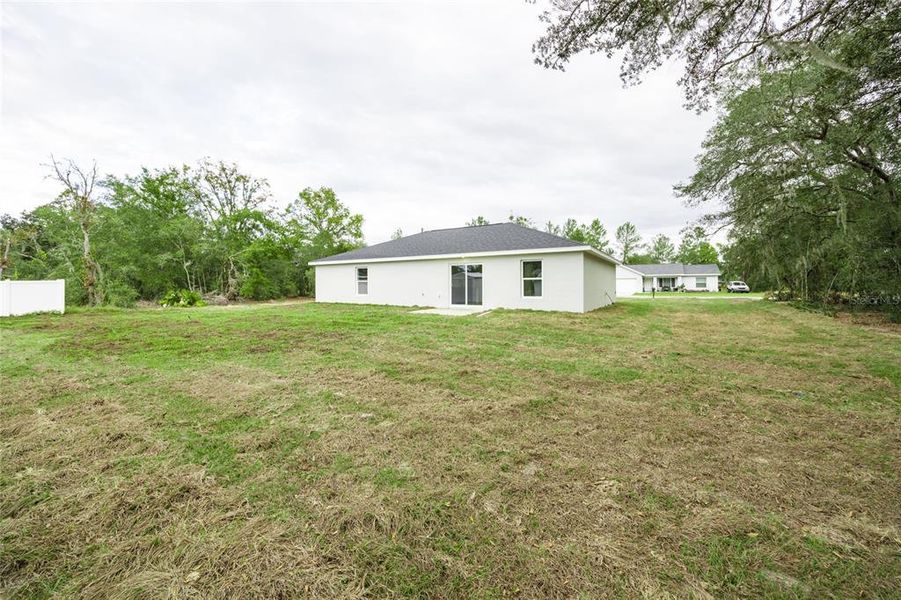 Exterior details and patio area of a home in , Ocklawaha (Image 3).