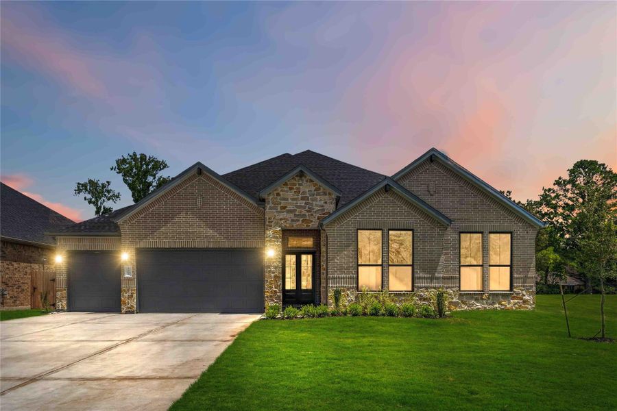 Front exterior of a new home in Friendswood Trails 70' Homesites, Friendswood, TX, highlighting curb appeal (Image 21).