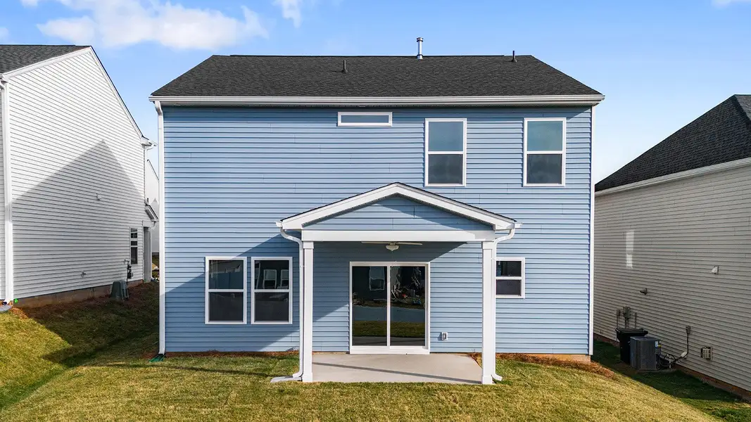 Exterior details and patio area of a home in Hanes Lake, Winston-Salem (Image 4).
