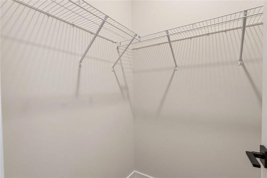 Functional closet space provides ample storage for