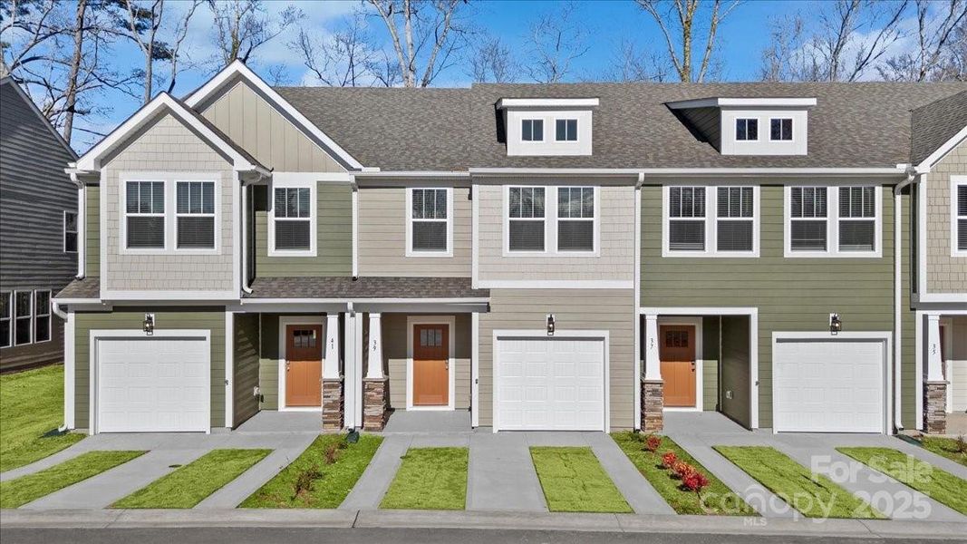 Front exterior of a new home in Clayton Crossing, Arden, NC, highlighting curb appeal (Image 1). Front exterior of a new home in Clayton Crossing, Arden, NC, highlighting curb appeal (Image 1).