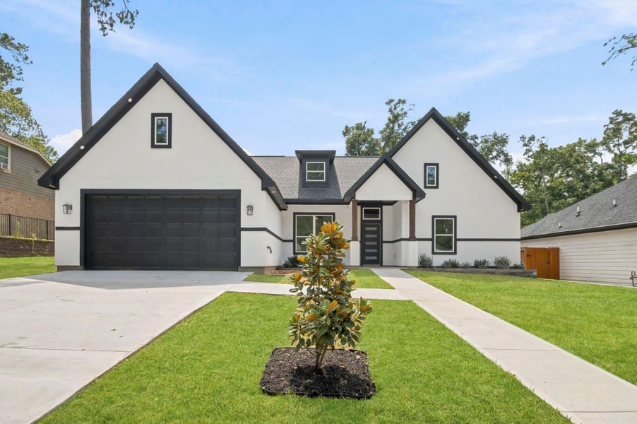 Striking the perfect balance between contemporary design and architectural character, this home instantly commands attention. The facade features dramatic roof peaks, unique window geometries, and a recessed entry porch with warm wooden columns. Striking the perfect balance between contemporary design and architectural character, this home instantly commands attention. The facade features dramatic roof peaks, unique window geometries, and a recessed entry porch with warm wooden columns.