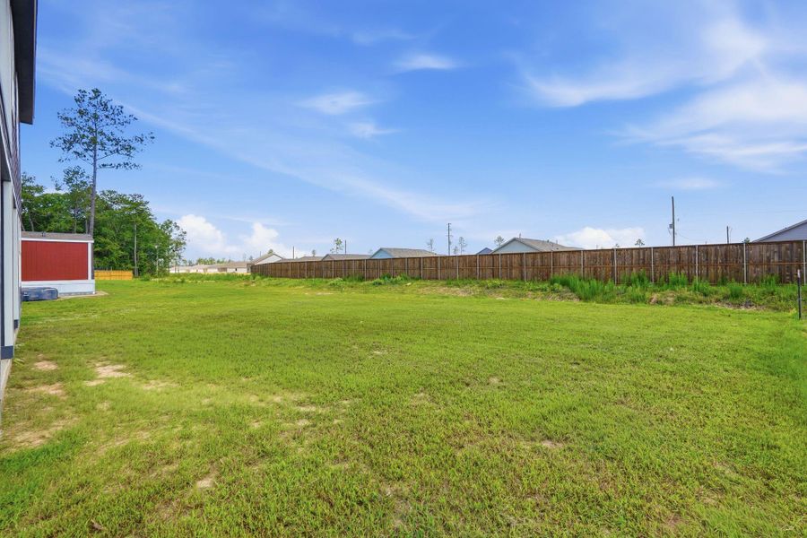 Exterior details and patio area of a home in , Conroe (Image 27).