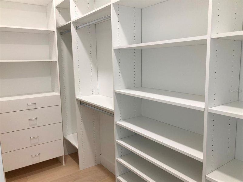 One of two master bedroom walk in closets One of two master bedroom walk in closets