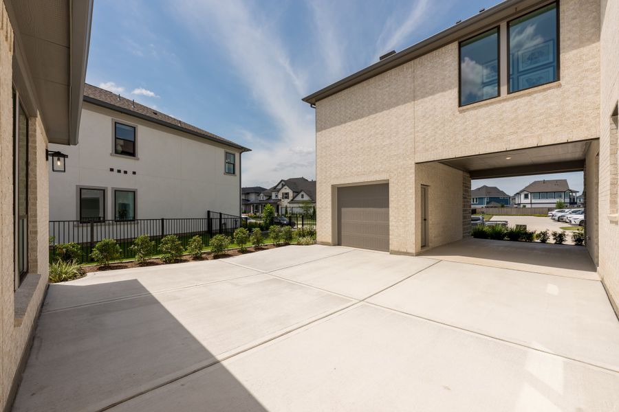 Representative exterior details of a home built from the Camden by Tri Pointe Homes in Bridgeland, Cypress (Image 27).