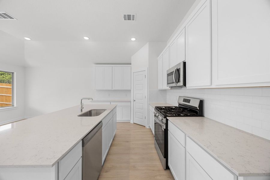 Furnished interior view inside a new home in Prairie Winds, Hutto (Image 8).