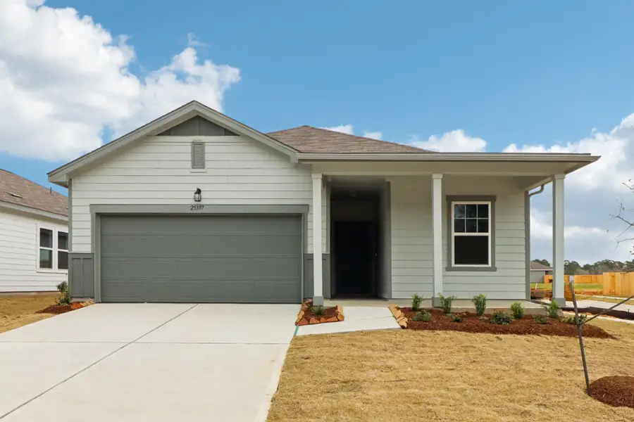 Front exterior of a new home in The Trails at Carmel, Pflugerville, TX, highlighting curb appeal (Image 2). Front exterior of a new home in The Trails at Carmel, Pflugerville, TX, highlighting curb appeal (Image 2).