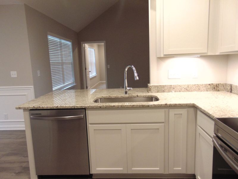 This kitchen is perfect for you to cook all your favorite dishes, the kitchen comes with steel appliances, crown cabinetry, under cabinet lighting, and plenty of cabinets for you to store all your goods.