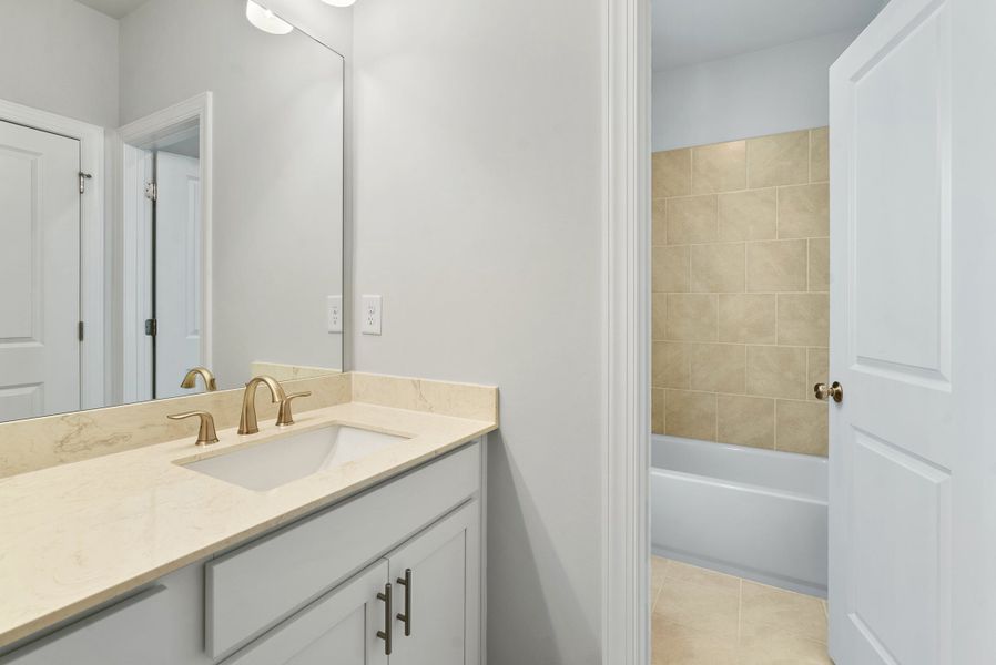 Representative furnished interior of a home built from the The Camilla by The Providence Group in Aberdeen, Hoschton (Image 13).