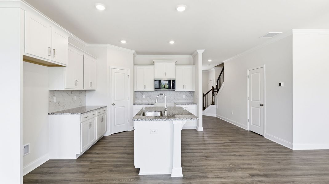 Furnished interior view inside a new home in Townes at Tap Root Farms, Fletcher (Image 6). Furnished interior view inside a new home in Townes at Tap Root Farms, Fletcher (Image 6).
