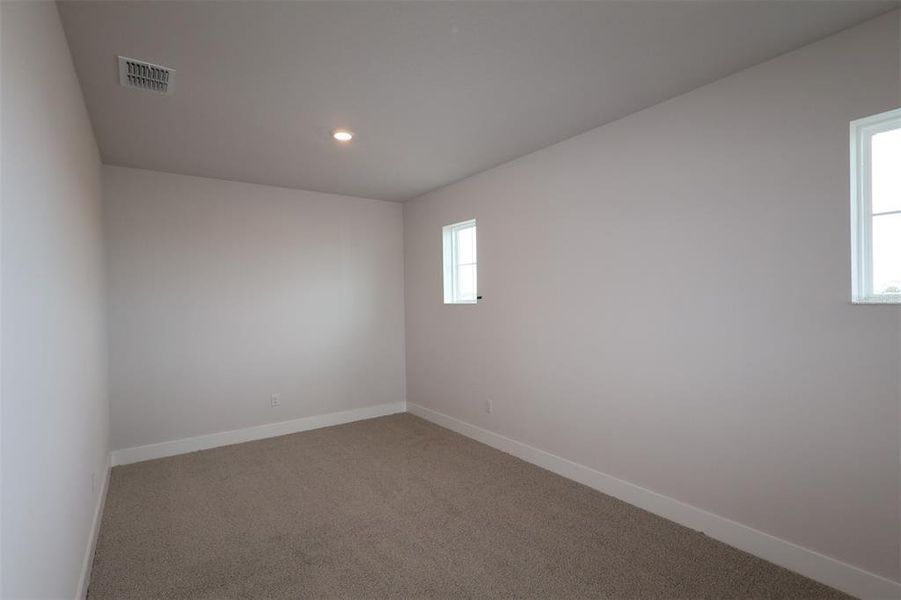 Spacious, unfurnished interior of a new home in Waterset Tradition Series, Apollo Beach (Image 21).