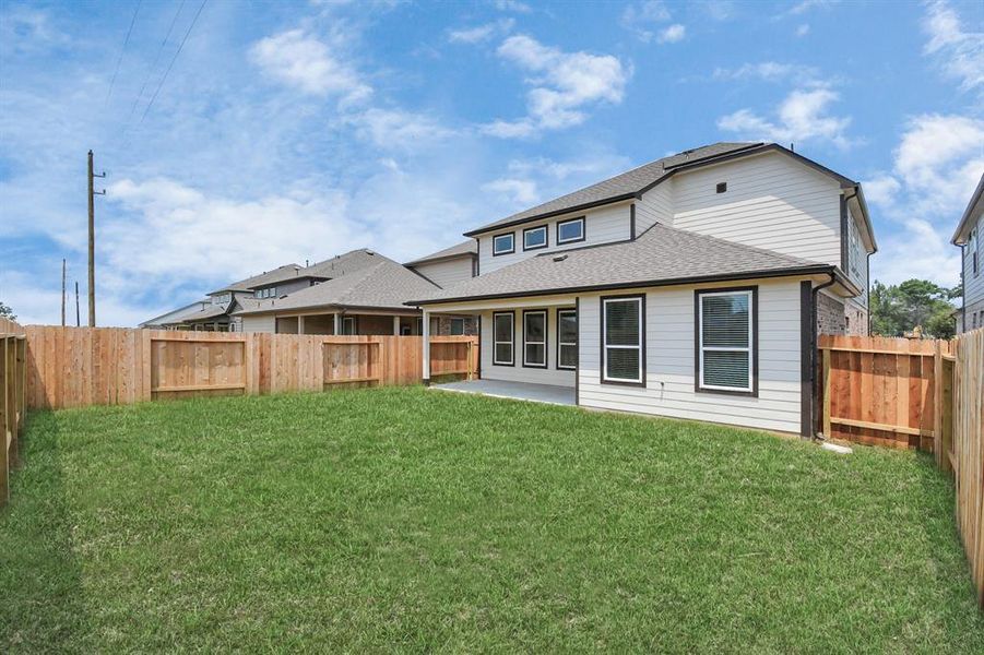 Backyard retreat, offering an abundance of space for kids to play and explore. The possibilities are endless in this outdoor haven, where the joy of open-air activities and family gatherings awaits.