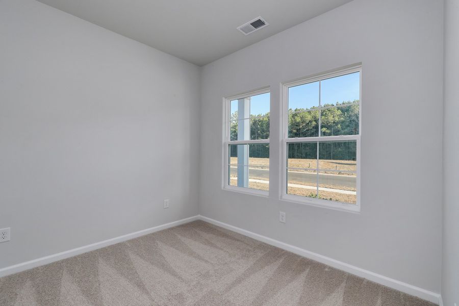 Spacious, unfurnished interior of a new home in Hainer Place, Conway (Image 39).