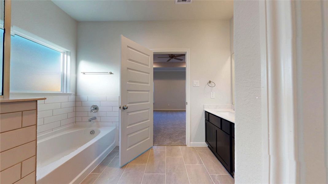 Furnished interior view inside a new home in Lexington Heights 50', Willis (Image 11).