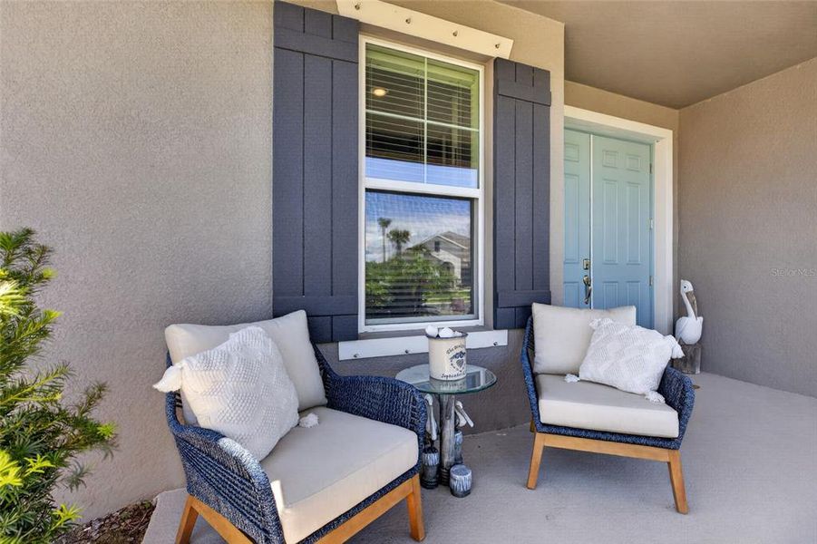Exterior details and patio area of a home in Seaire, Parrish (Image 31).