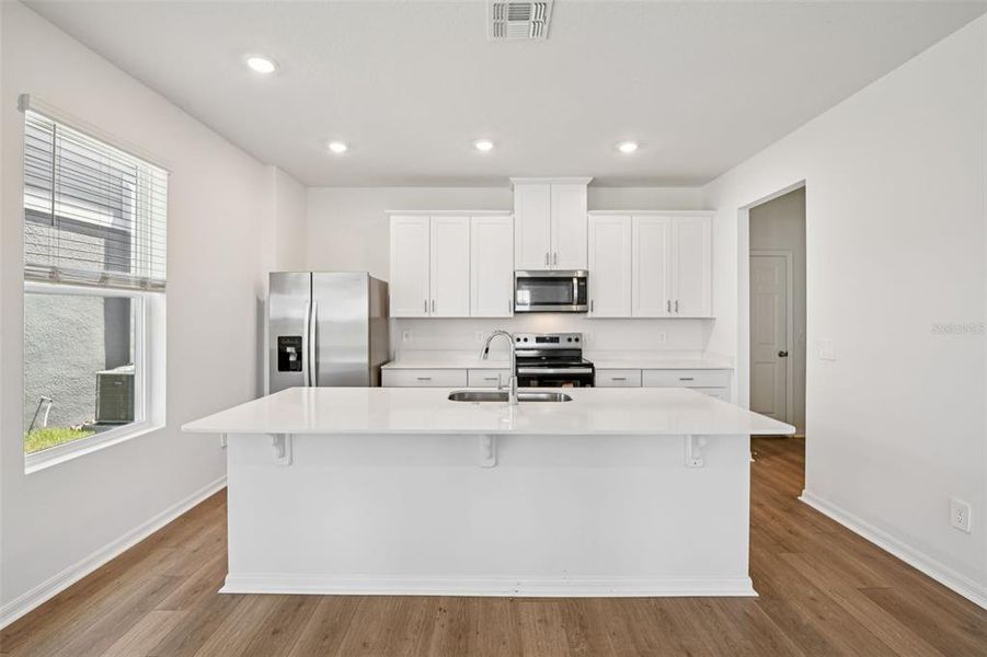 Furnished interior view inside a new home in The Meadow at Crossprairie Bungalows, St. Cloud (Image 10).