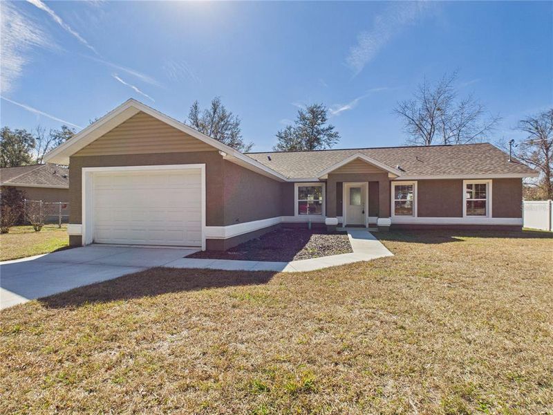 Front exterior of a new home in , Ocala, FL, highlighting curb appeal (Image 19).