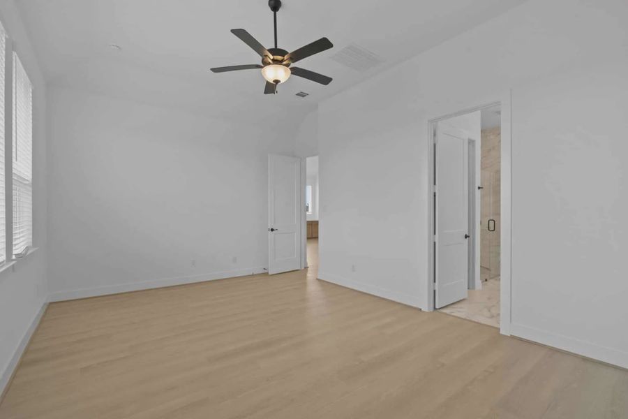 Representative unfurnished interior of a home built from the Lauren by Chesmar Homes in Beacon Point, Texas City (Image 34). Representative unfurnished interior of a home built from the Lauren by Chesmar Homes in Beacon Point, Texas City (Image 34).