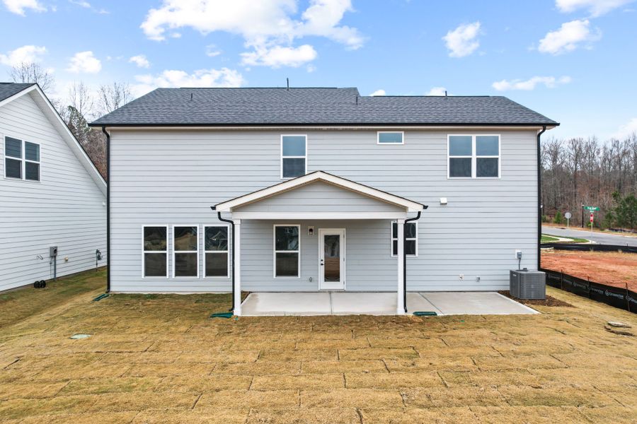 Exterior details and patio area of a home in Forest Creek, Waxhaw (Image 30).