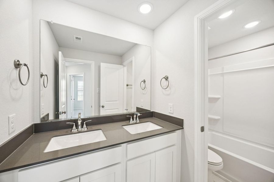 Furnished interior view inside a new home in Saint Tropez, Huffman (Image 11). Furnished interior view inside a new home in Saint Tropez, Huffman (Image 11).