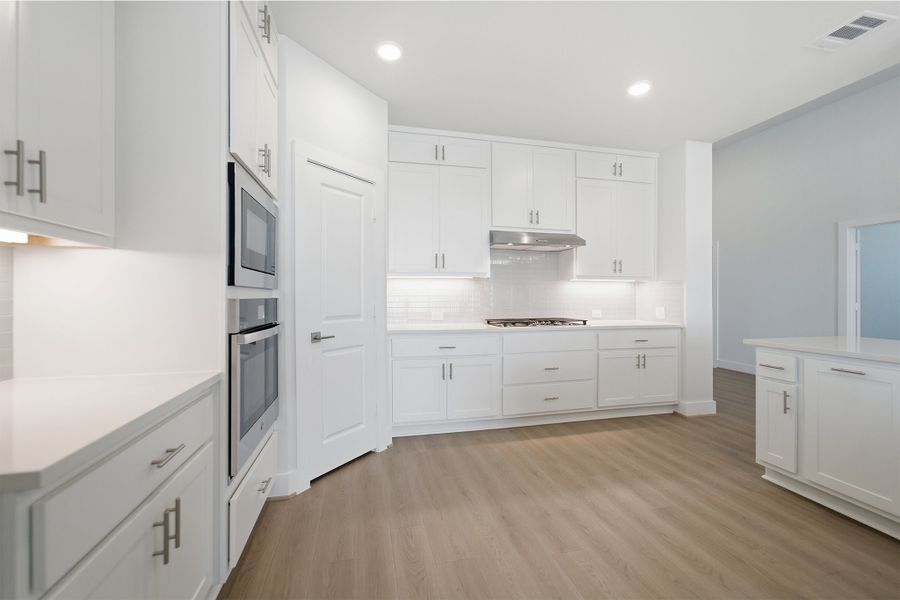 Furnished interior view inside a new home in Santa Rita Ranch, Liberty Hill (Image 9).