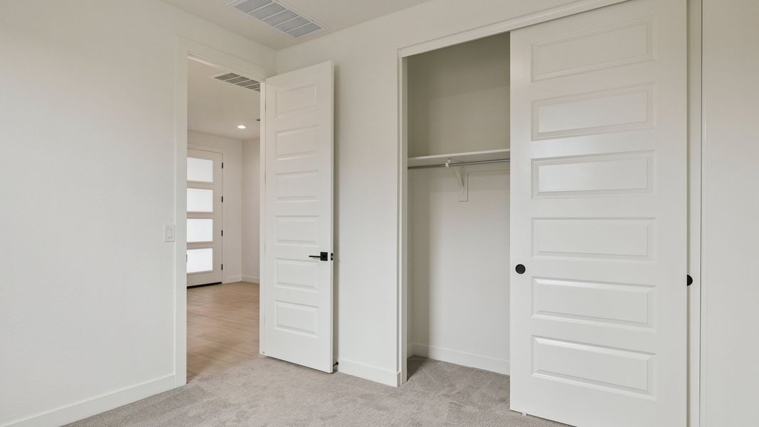 Spacious, unfurnished interior of a new home in The Ridge at Stone Butte, Phoenix (Image 20).