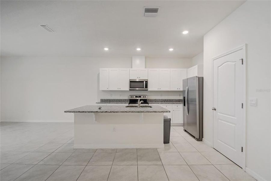 Furnished interior view inside a new home in , Howey-in-the-Hills (Image 10).