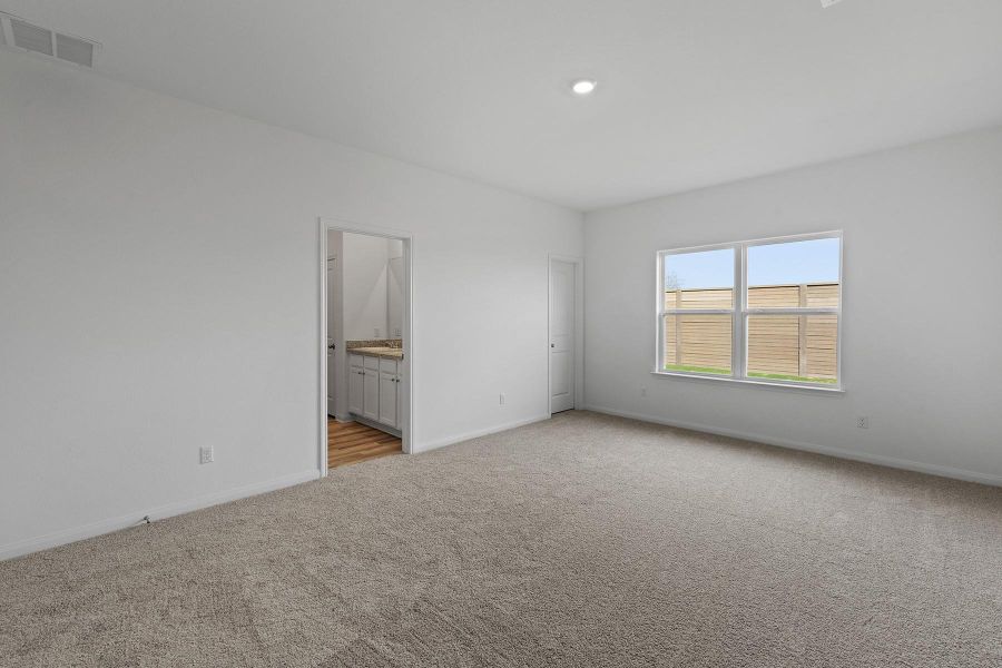 Peace and privacy await you in the master suite. this luxurious retreat offers an incredible amount of space, serene backyard views and a spa-like master bath.