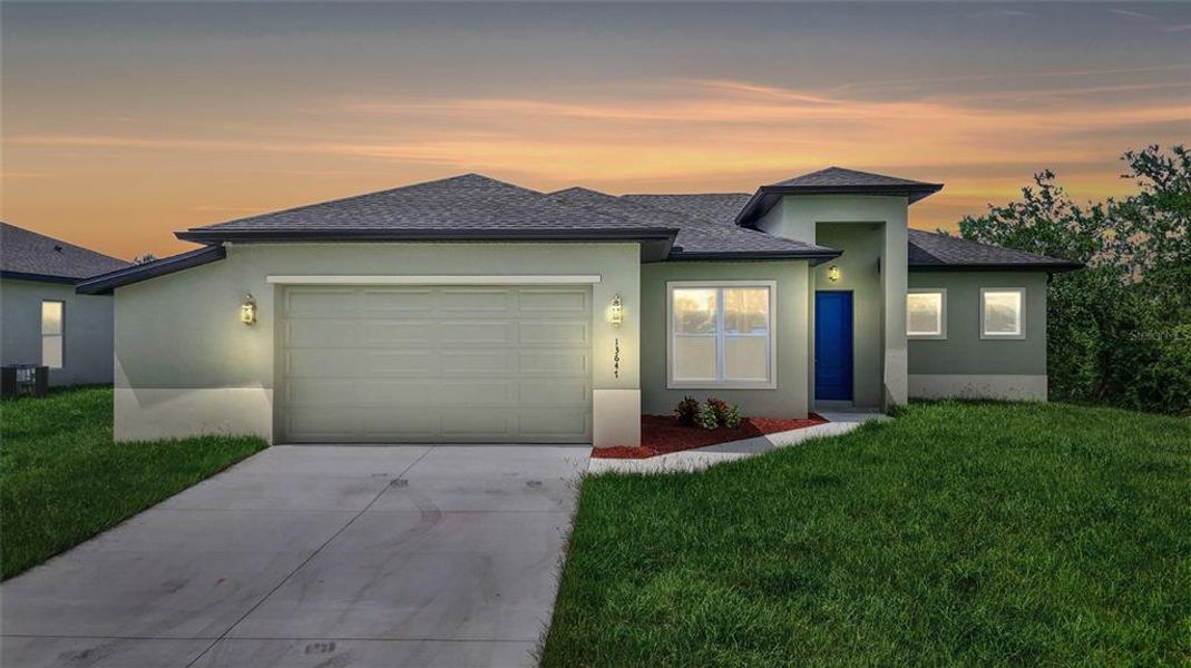 Front exterior of a new home in , Port Charlotte, FL, highlighting curb appeal (Image 21).