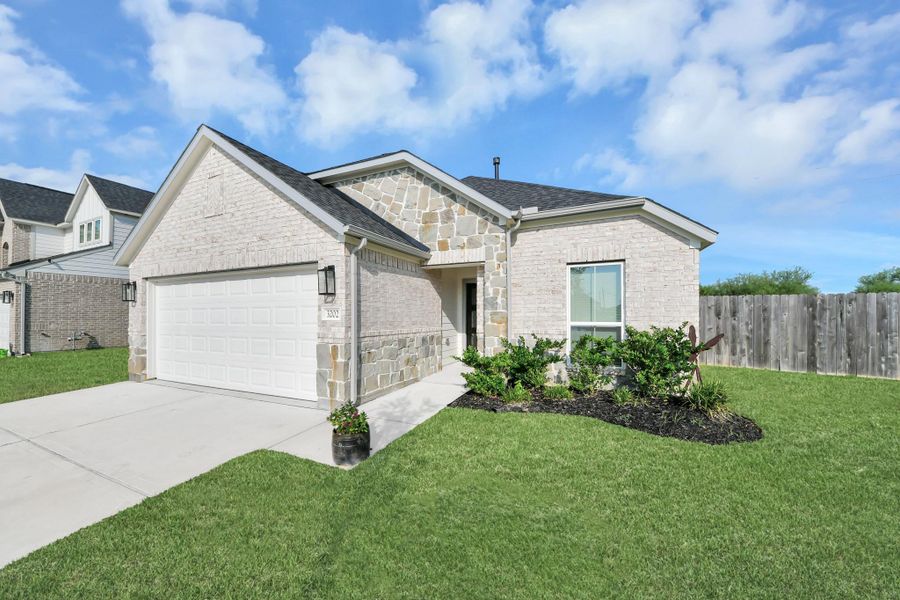 Front exterior of a new home in Briarwood Crossing, Rosenberg, TX, highlighting curb appeal (Image 24).