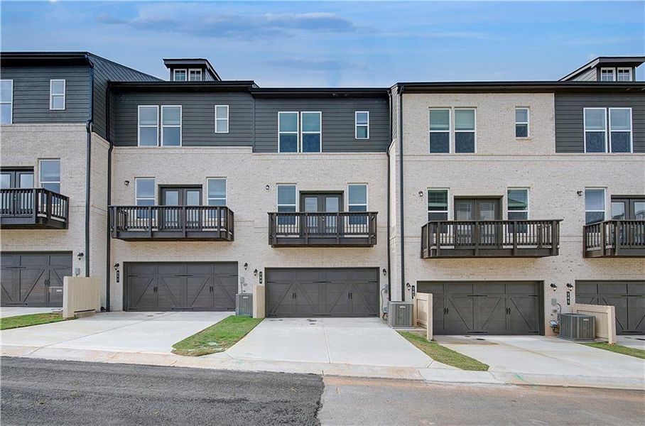 Front exterior of a new home in Daybreak, Newnan, GA, highlighting curb appeal (Image 18).