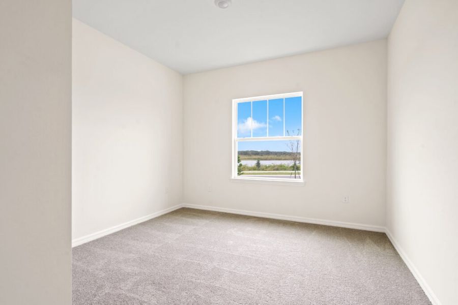 Representative unfurnished interior of a home built from the Biscayne by Holiday Builders in Eden Hills, Lake Alfred (Image 17).