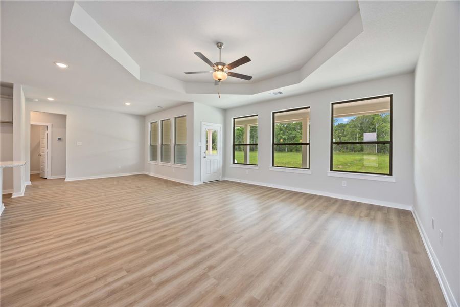 Relax and unwind in this welcoming family room featuring soft neutral hues and beautiful natural lighting. Relax and unwind in this welcoming family room featuring soft neutral hues and beautiful natural lighting.