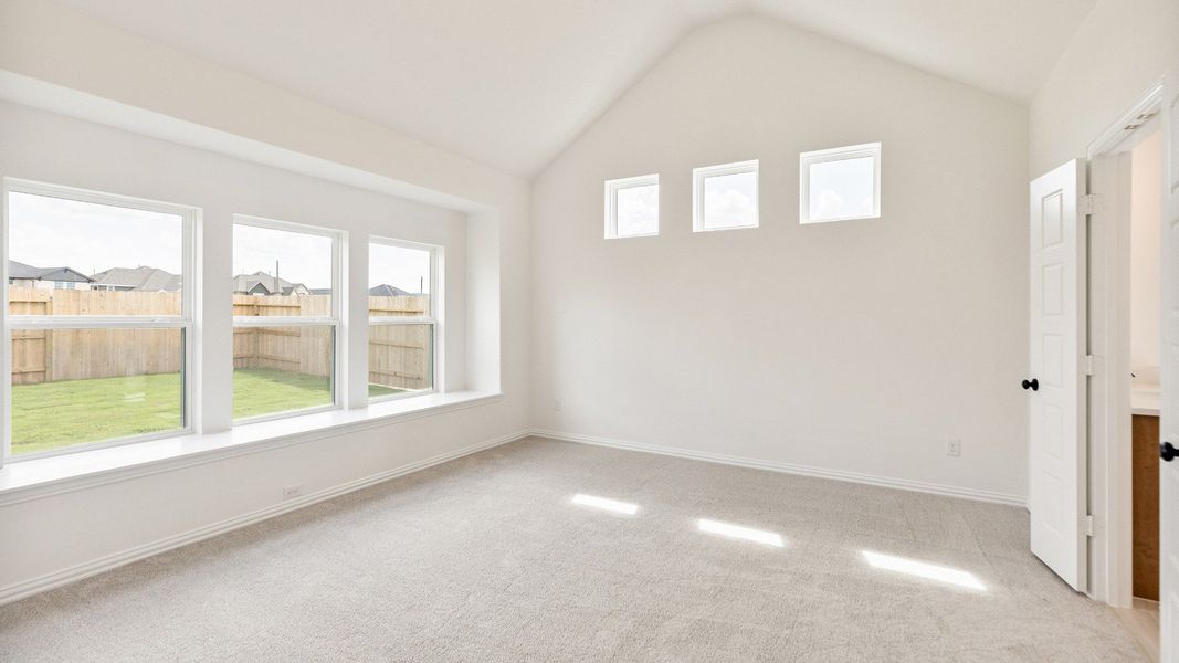 Furnished interior view inside a new home in Creekhaven, Iowa Colony (Image 16).