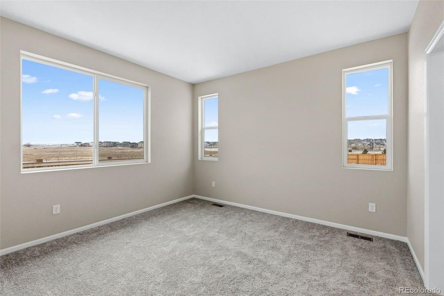 Spacious, unfurnished interior of a new home in The Cottages Collection at Ridgeline Vista, Brighton (Image 15).