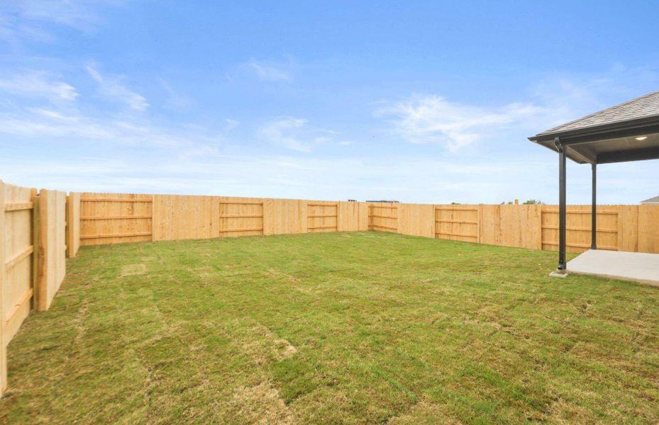 Exterior details and patio area of a home in Patterson Ranch, Georgetown (Image 18).