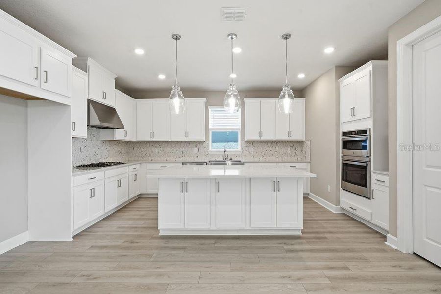 Furnished interior view inside a new home in Coasterra Community Group Page, Palmetto (Image 3).