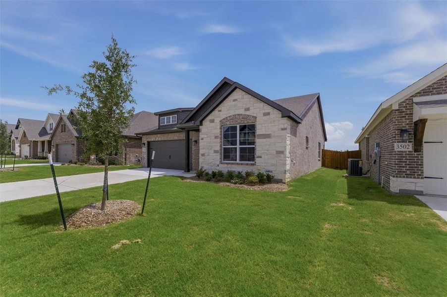 Stone and brick exterior with dark trim accents