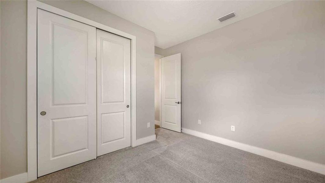 Spacious, unfurnished interior of a new home in Woodland Preserve, Parrish (Image 23).