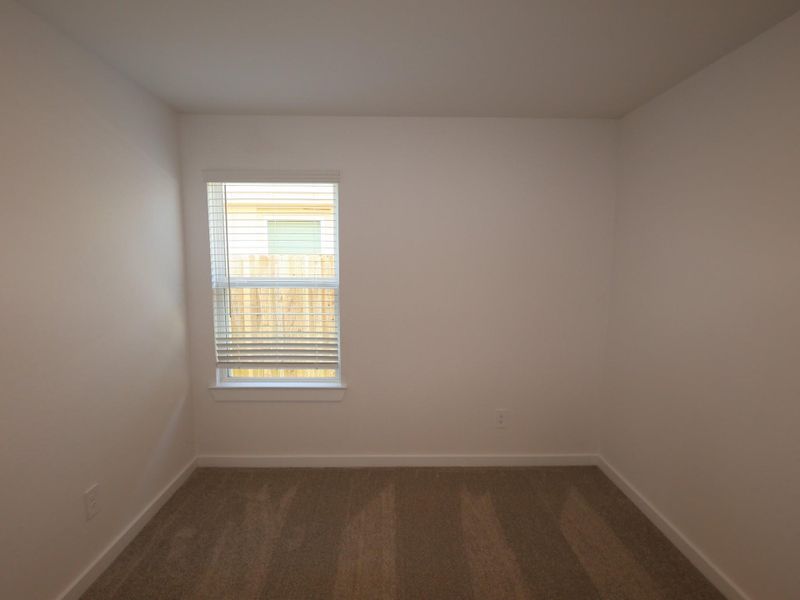 Spacious, unfurnished interior of a new home in Pinewood at Grand Texas, New Caney (Image 7).