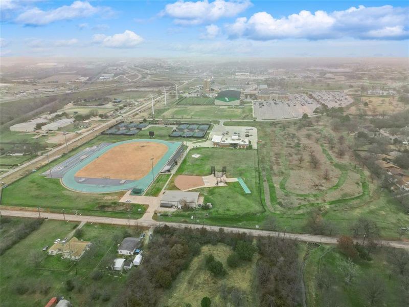 Aerial view of the Courts of Bonnie Brae community in Denton, TX, showing layout and nearby surroundings (Image 11).