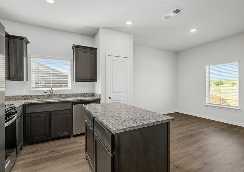 The dining room sits adjacent to the kitchen.