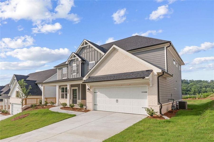 Front exterior of a new home in The Estates at Gainesville Township, Gainesville, GA, highlighting curb appeal (Image 1). Front exterior of a new home in The Estates at Gainesville Township, Gainesville, GA, highlighting curb appeal (Image 1).
